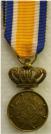 Eremedaille Orde van Oranje Nassau brons draagminiatuur, diameter 16,2mm. Prijs: .30,-
