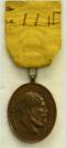 Medaille voor Ijver en Trouw bij 's-Rijks Land- en Zeemacht. Brons (12 jaar). Ingesteld 1877. Slechts uitgereikt t/m 1890! Ontwerp: Jan Menger. Prijs: .125,-
