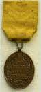 Medaille voor Ijver en Trouw bij 's-Rijks Land- en Zeemacht. Brons (12 jaar). Ingesteld 1877. Slechts uitgereikt t/m 1890! Ontwerp: Jan Menger. Prijs: .125,-