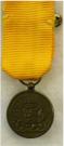 Draagminiatuur van de Medaille voor Trouwe Dienst bij de Koninklijke Landmacht. Brons, 12 jaar. Periode: Juliana, diameter 16mm. Prijs: �.20,-