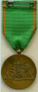 Keerzijde van de Vrijwilligersmedaille voor Openbare Orde en Veiligheid. Ingesteld 1958. 
