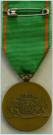 Keerzijde van de Vrijwilligersmedaille voor Openbare Orde en Veiligheid. Ingesteld 1958. Met gesp XX. Prijs: �.45,-