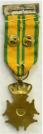 Kruis voor Betoonde Marsvaardigheid (Vierdaagsekruis). Ge�mailleerde versie met cijfer 21 voor 21e deelname. Maker: W. v. Veluw BV Zeist. Prijs: �.85,-